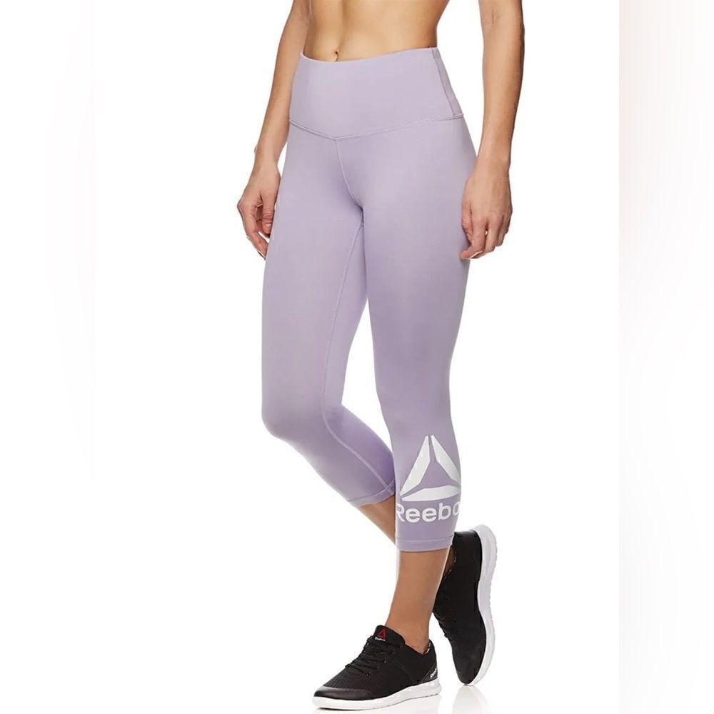 Stay Fit in Style: Reebok Women's Wanderlust Capri Compression Athletic Pants